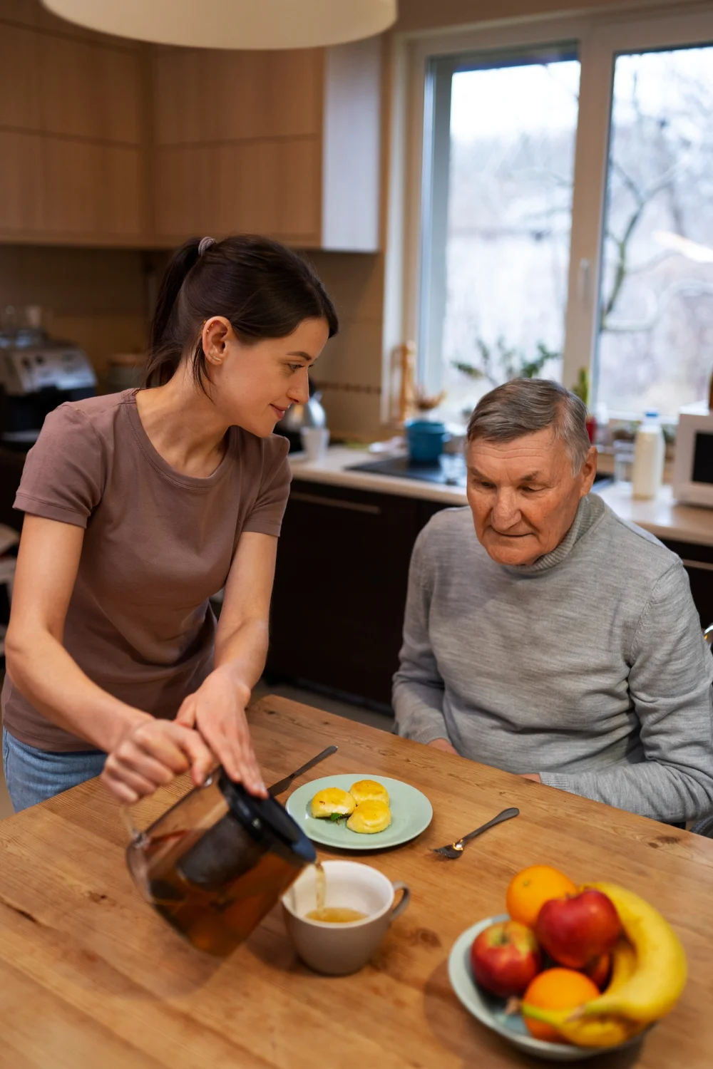 Caregiver helping a person with autism, showcasing the benefits of in-home services.