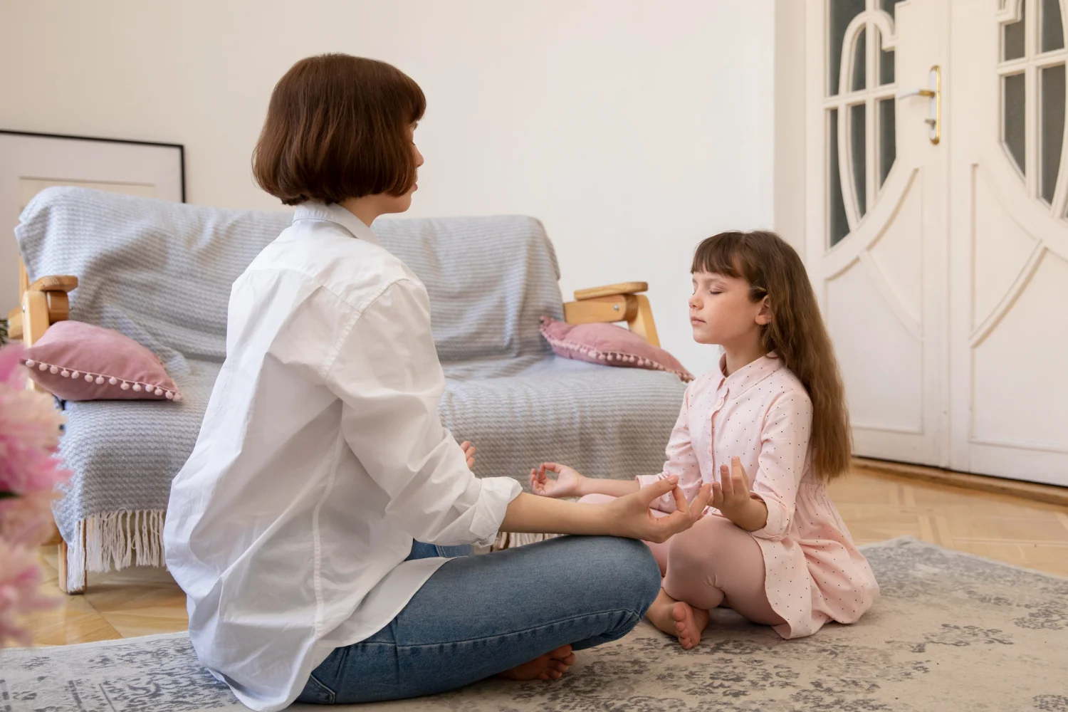 A therapist conducting a comprehensive speech-language therapy session with clients of different ages